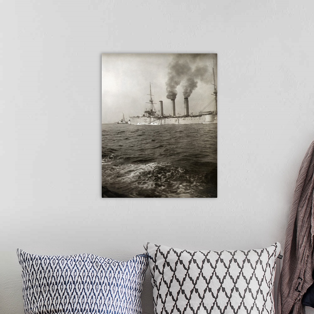 A bohemian room featuring An American cruise ship being guided by a tugboat past the Statue of Liberty, as it arrives in Ne...
