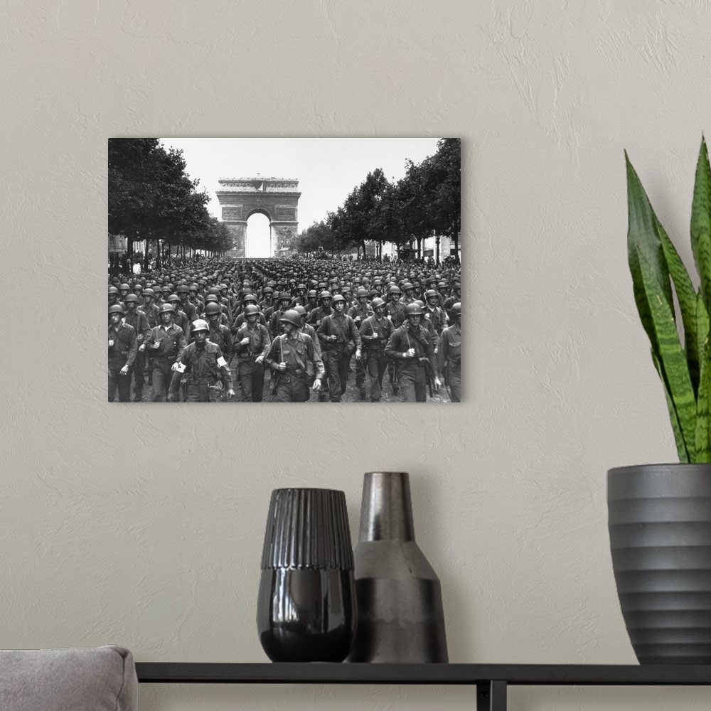 A modern room featuring American troops marching on the Avenue des Champs-?lys?es in Paris, France, with the Arc de Triom...