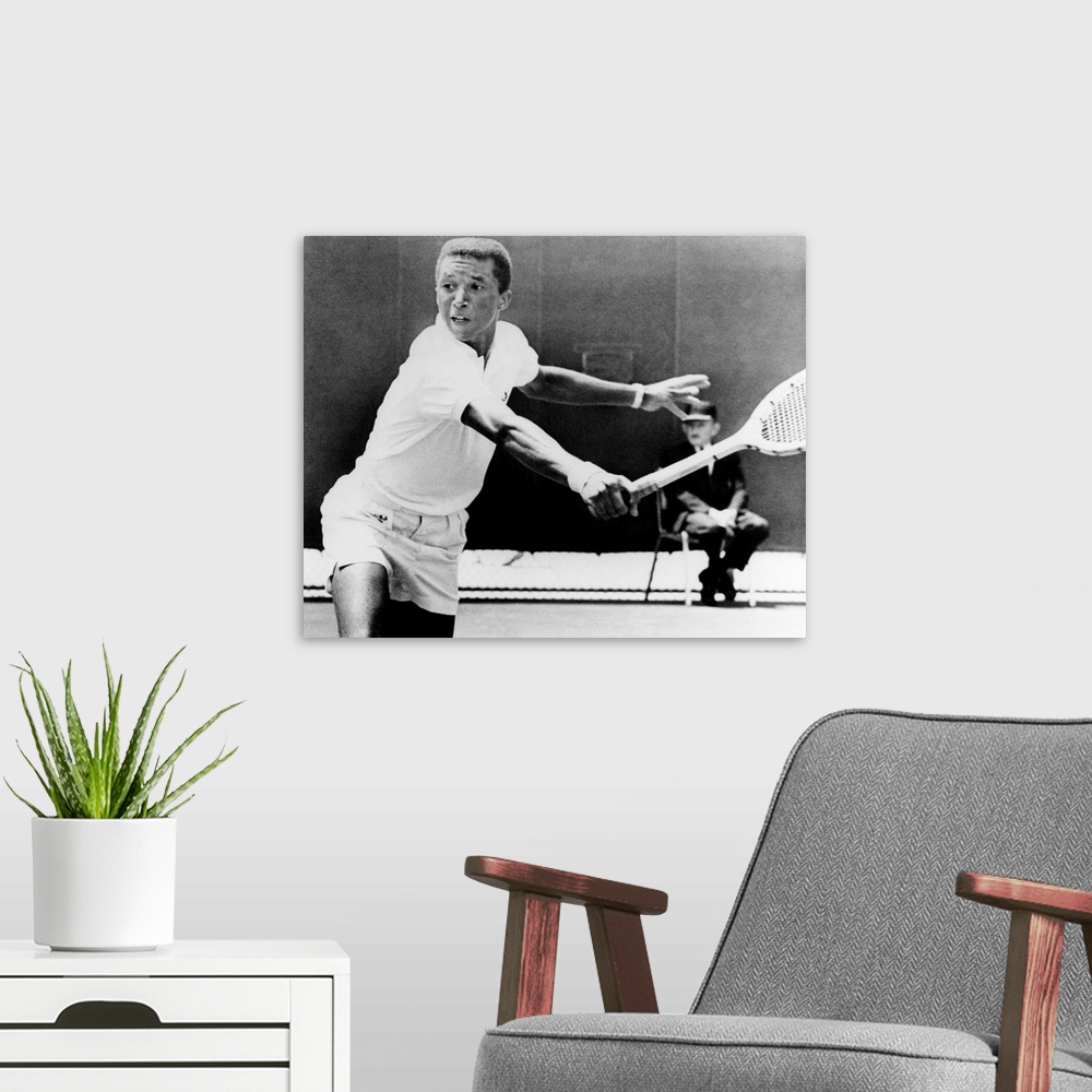 A modern room featuring American tennis player. Ashe playing for UCLA in a match against Mike Belkin of the University of...