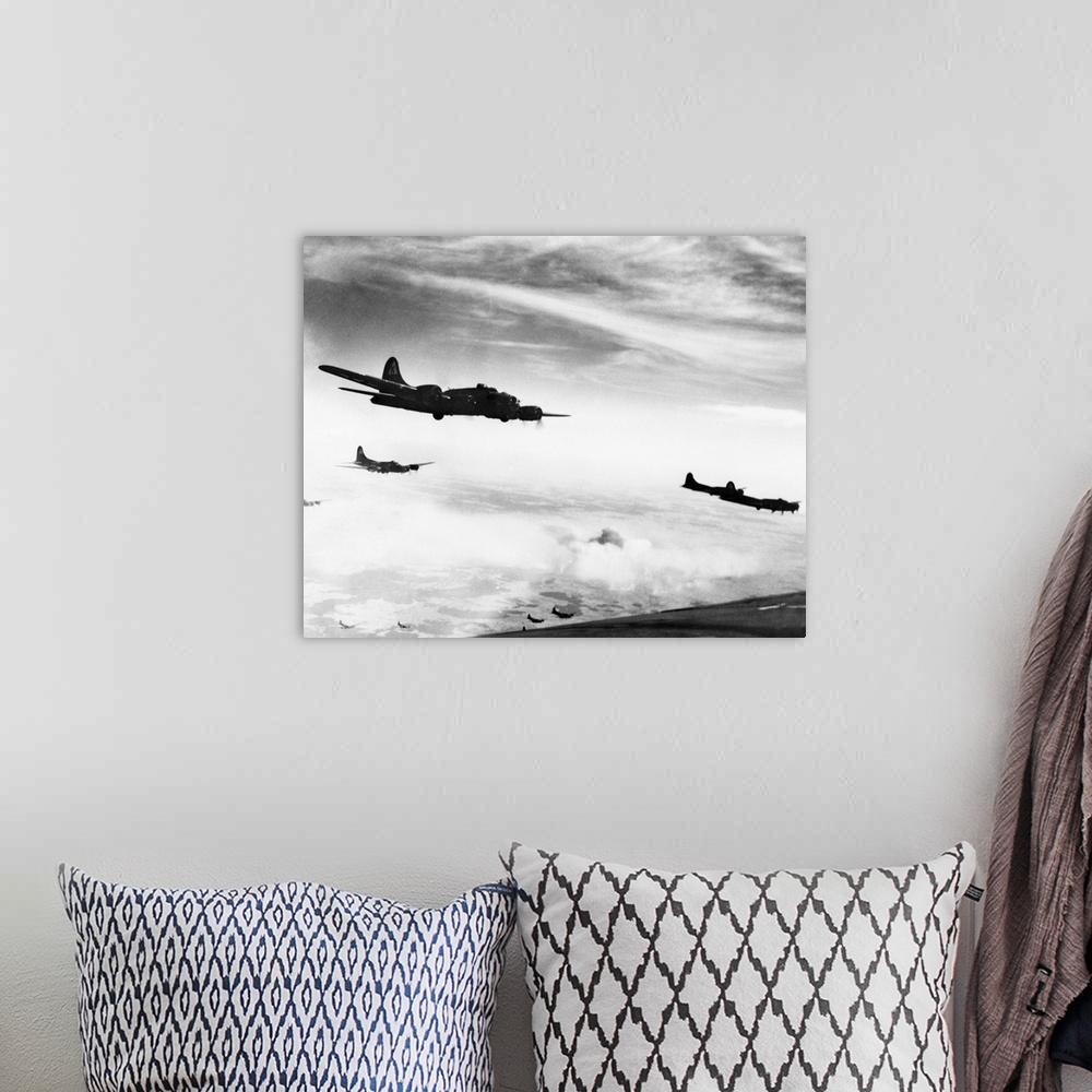 A bohemian room featuring B-17 Flying Fortresses of the U.S. Air Force flying over Schweinfurt, Germany. Photograph, c1944.