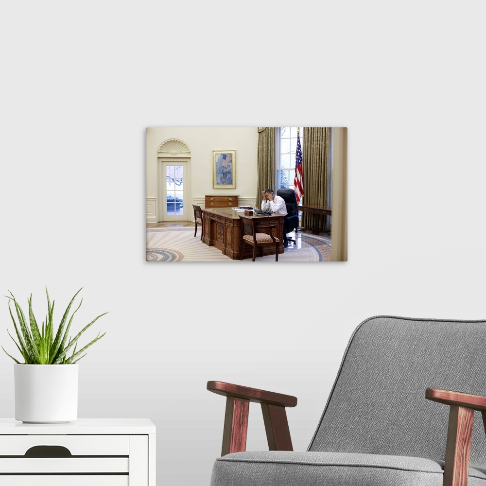 A modern room featuring BARACK OBAMA (1961- ). 44th President of the United States. Photographed by Pete Souza in the Ova...