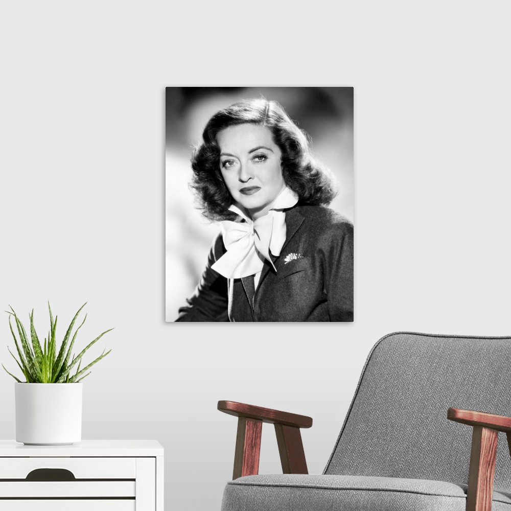 A modern room featuring American actress. Photographed in the role of Margo Channing in 'All About Eve,' 1950.