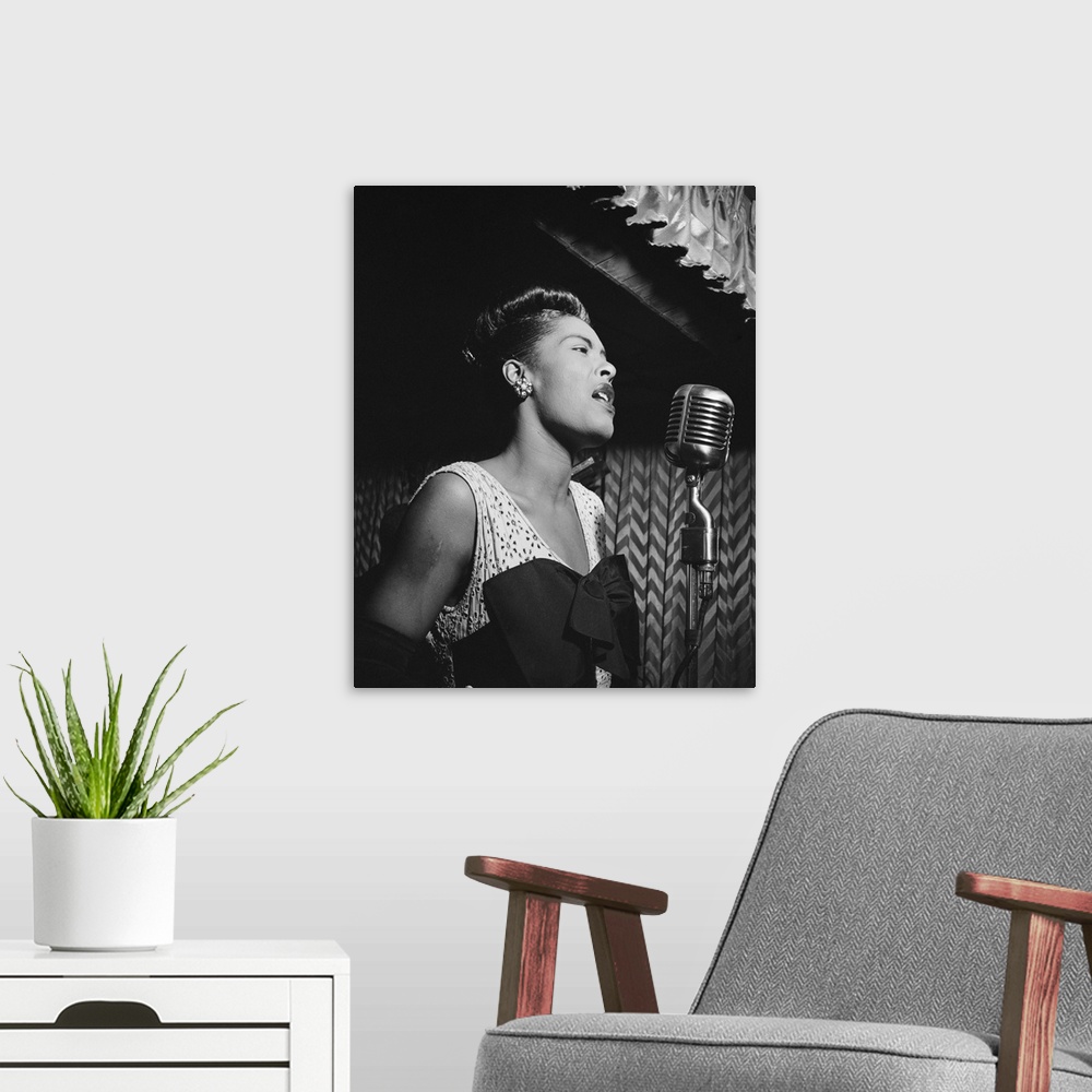 A modern room featuring American singer. Performing at Downbeat in New York City. Photograph by William P. Gottlieb, c1947.