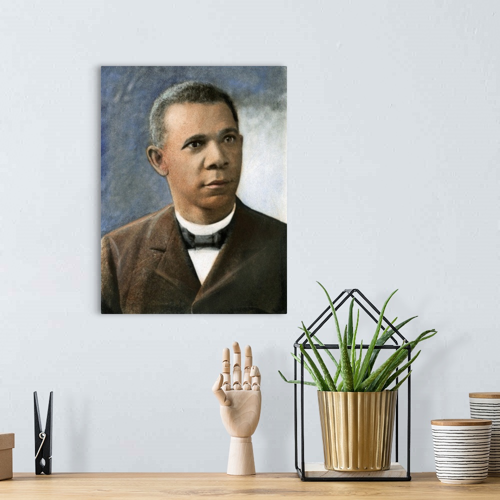 A bohemian room featuring BOOKER T. WASHINGTON (1856-1915). American educator. Oil over a photograph, c1899.