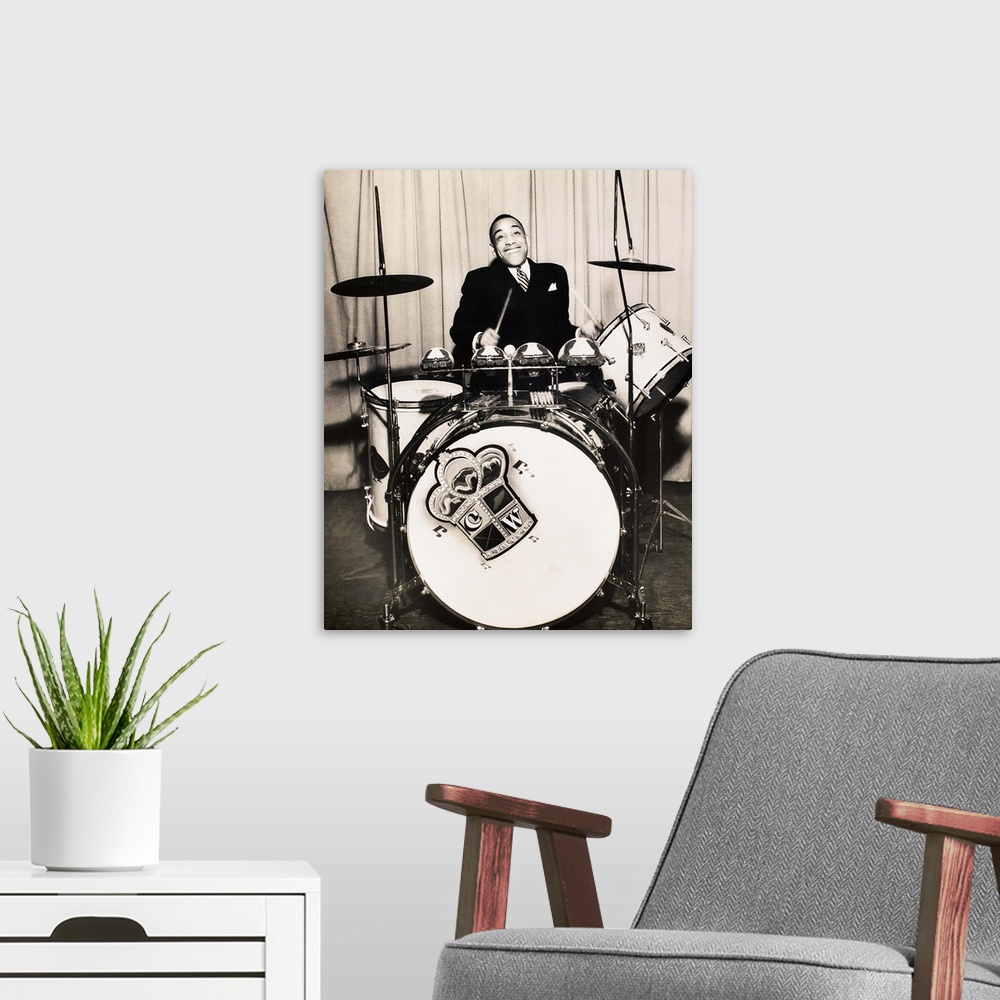 A modern room featuring Born William Henry Webb. American Jazz drummer and big band leader. Photograph, 1930s.