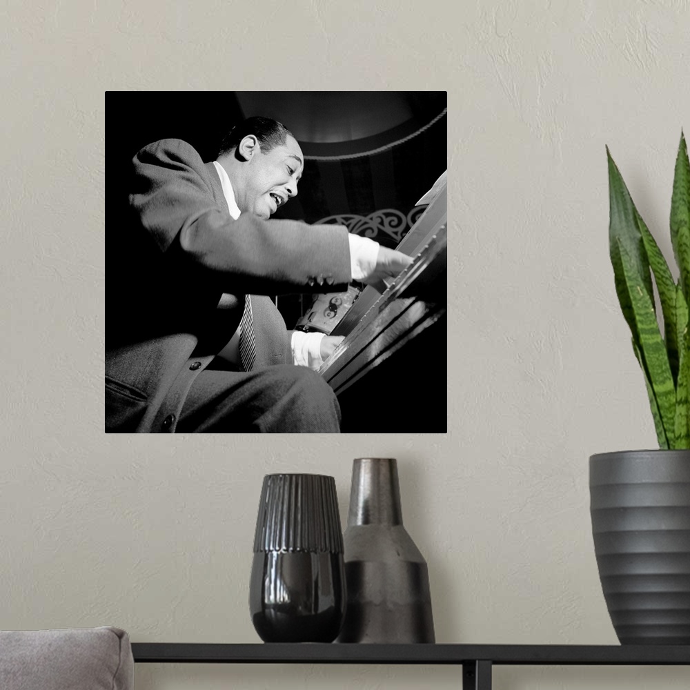 A modern room featuring DUKE ELLINGTON (1899-1974). American musician and composer. Performing at the Aquarium in New Yor...