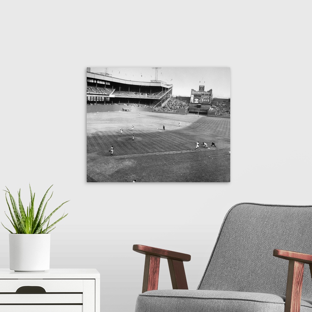 A modern room featuring Dusty Rhodes of the New York Giants being thrown out at first base for the final out of the Giant...