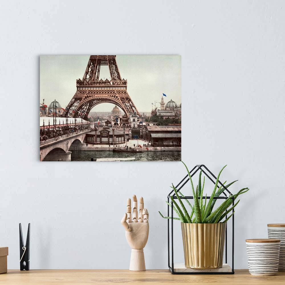 A bohemian room featuring A view of the Eiffel Tower and a general view of the grounds of the Exposition Universelle of 190...