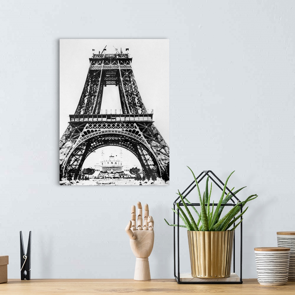 A bohemian room featuring Building the Eiffel Tower on the Champ de Mars in Paris, France, for the Universal Exposition of ...