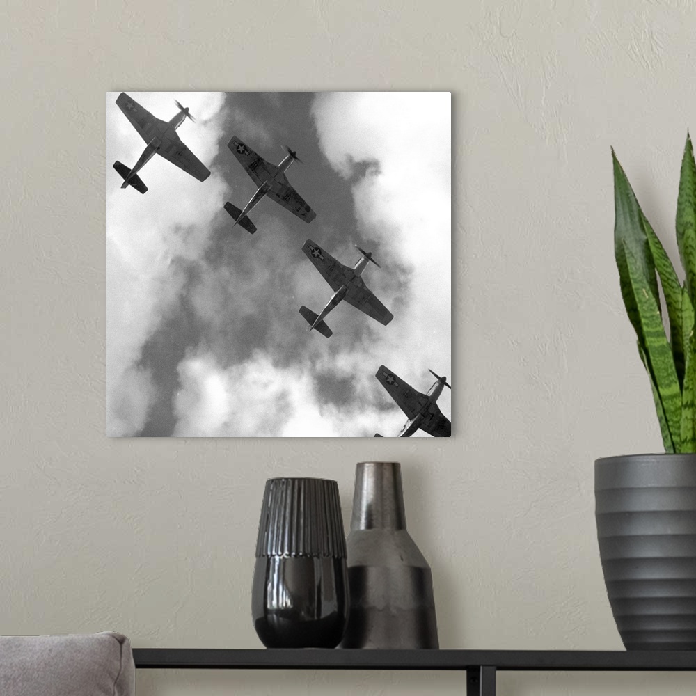 A modern room featuring Four P-51 Mustang fighter planes flying in formation over Ramitelli, Italy. Photograph by Toni Fr...