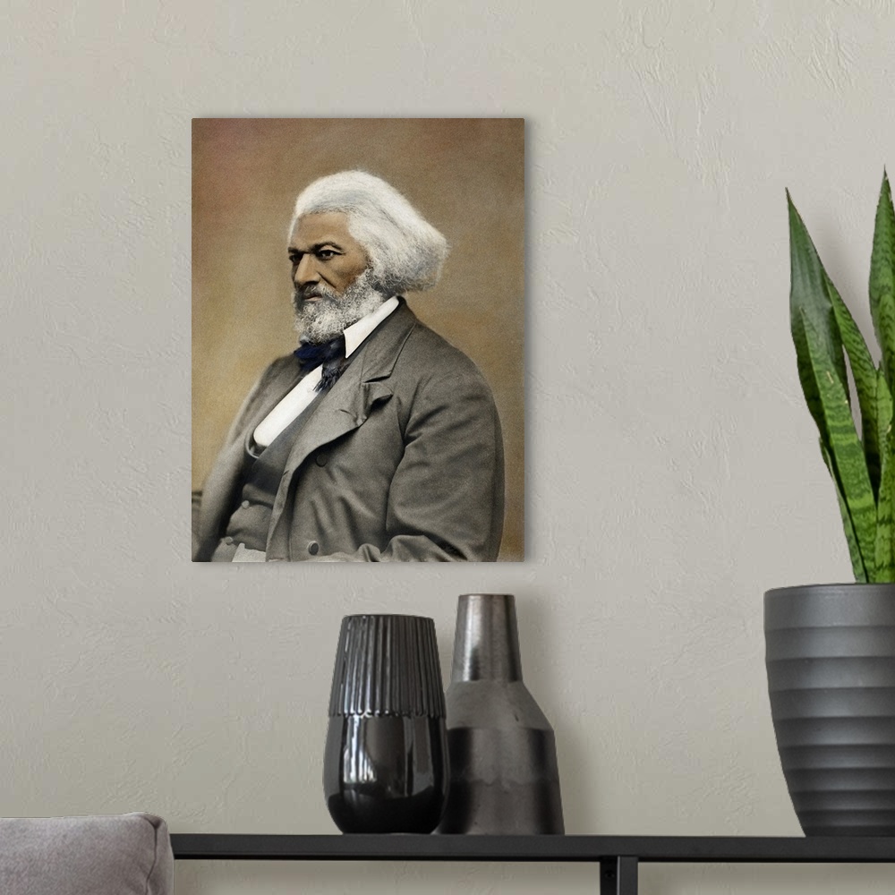 A modern room featuring FREDERICK DOUGLASS(c1817-1895). American abolitionist and writer. Oil over a photograph, c1885.