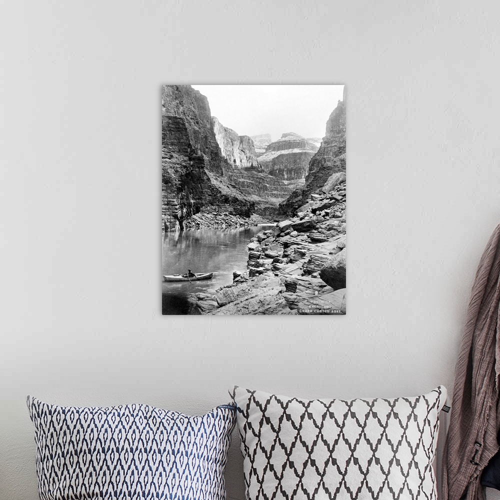 A bohemian room featuring Grand Canyon, C1913. A View Of the Grand Canyon In Arizona, Showing A Man In A Boat On A River In...