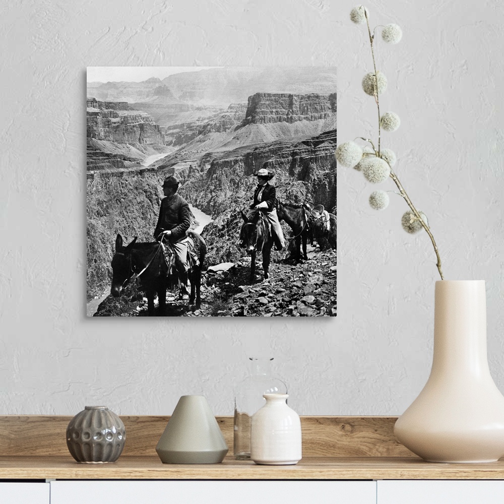 A farmhouse room featuring Grand Canyon, Sightseers. A Man And A Woman Riding Mules Along the Edge Of A Precipice On the Gra...