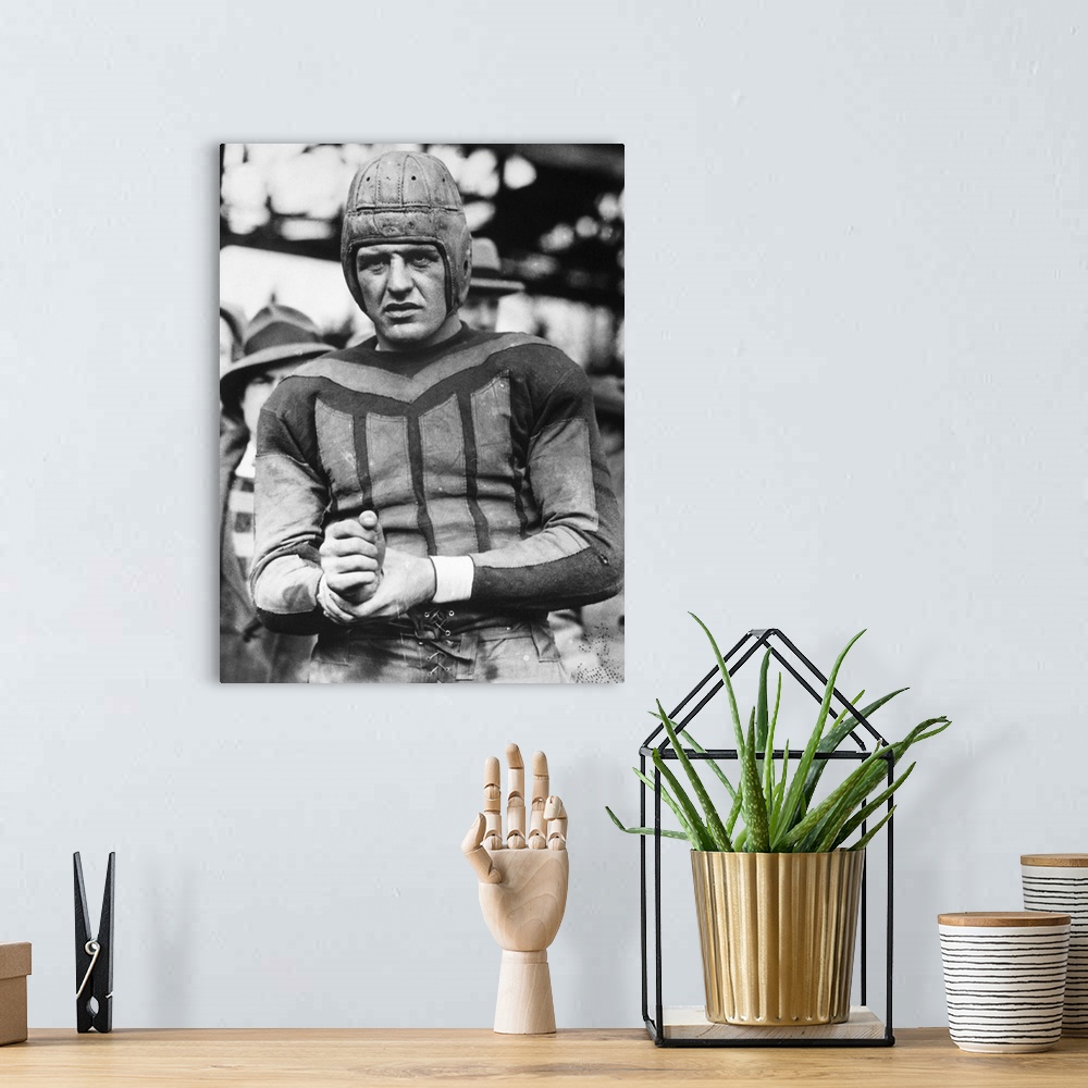A bohemian room featuring (1903-1991). American football player.