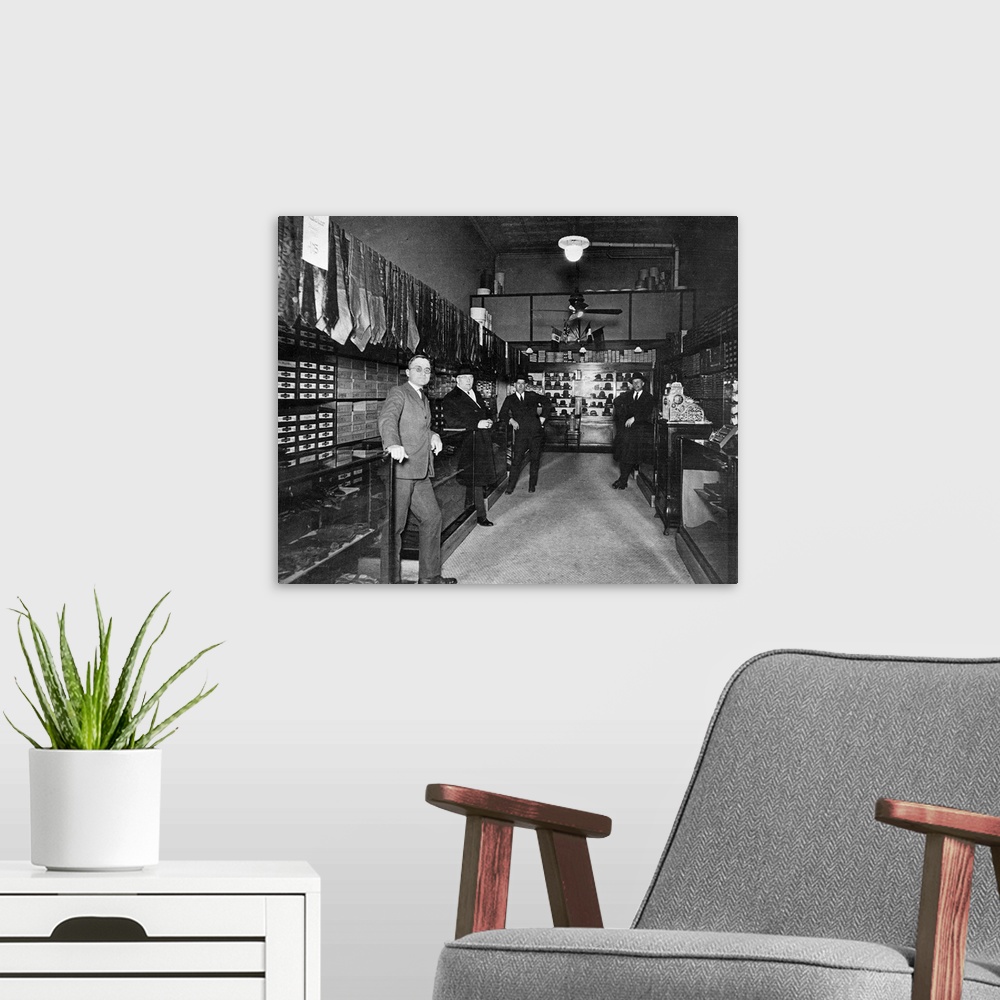 A modern room featuring 33rd President of the United States. The future president (left foreground) photographed inside t...