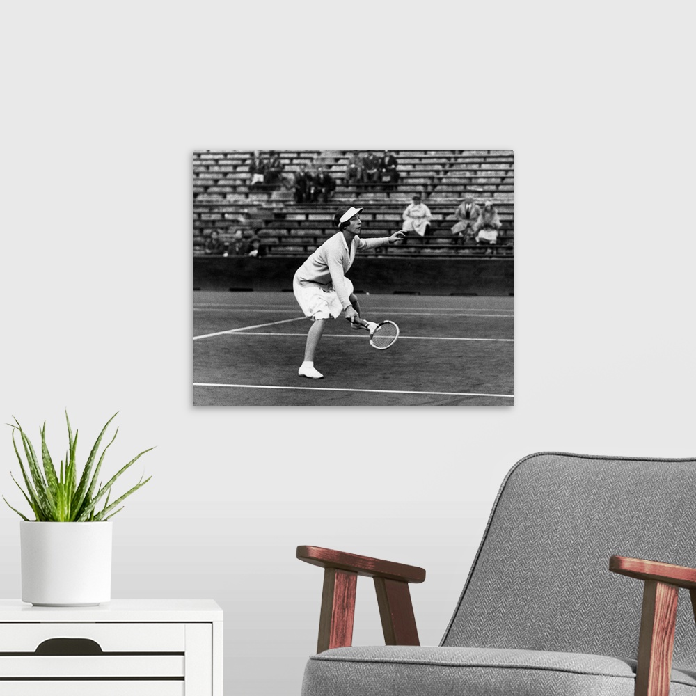 A modern room featuring (1906-1998). American tennis player. Photographed during a match, c1930.