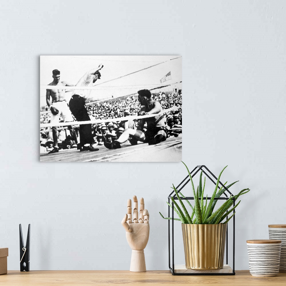 A bohemian room featuring American boxer. Jack Dempsey (left) winning the heavyweight championship from Jess Willard on 4 J...
