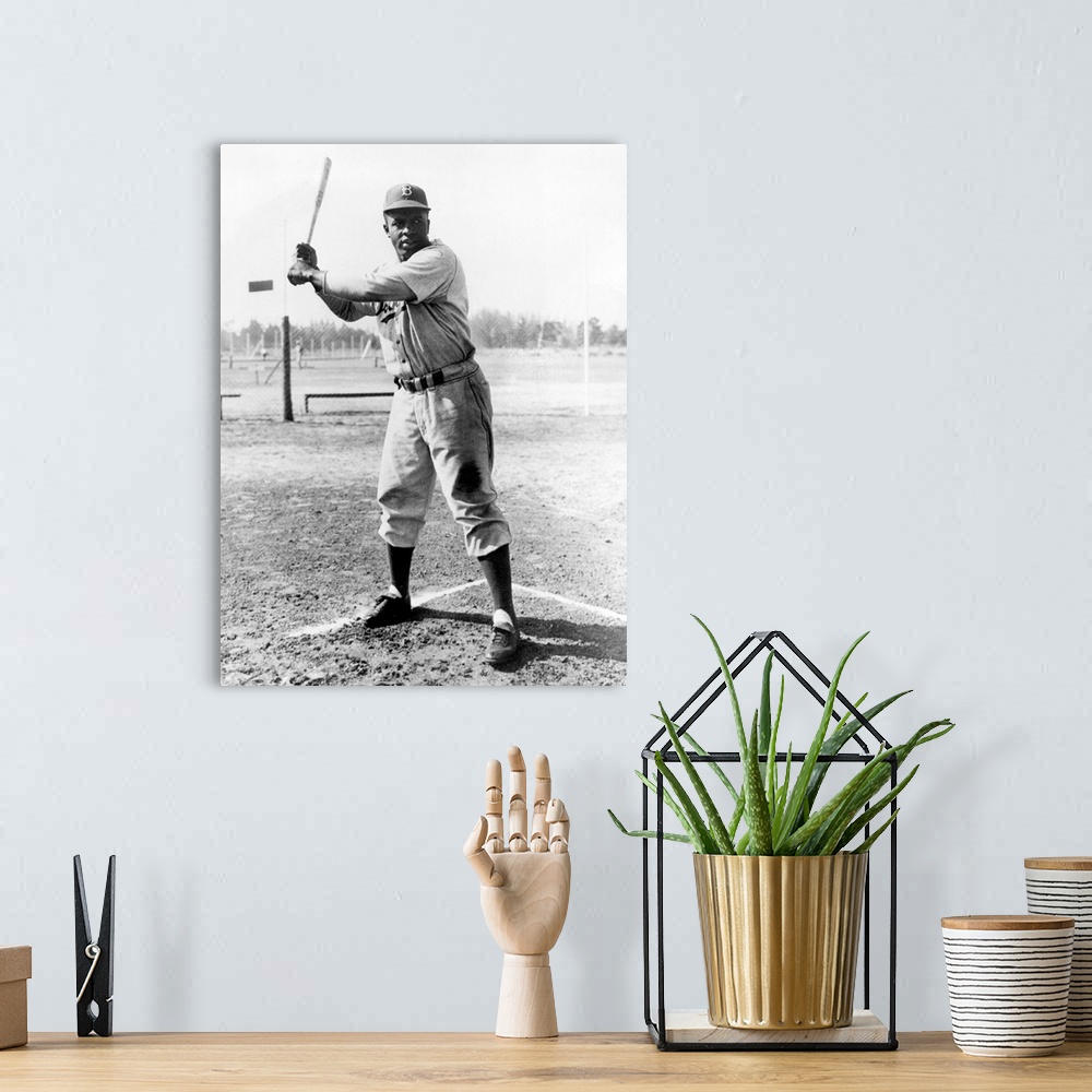 A bohemian room featuring John Roosevelt Robinson, known as Jackie. American baseball player. Photographed while a member o...