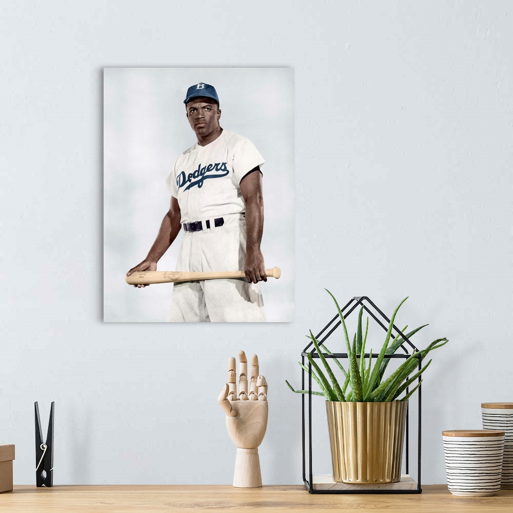 A bohemian room featuring JACKIE ROBINSON (1919-1972). American baseball player. Photograph, 1950, digitally colored by Gra...
