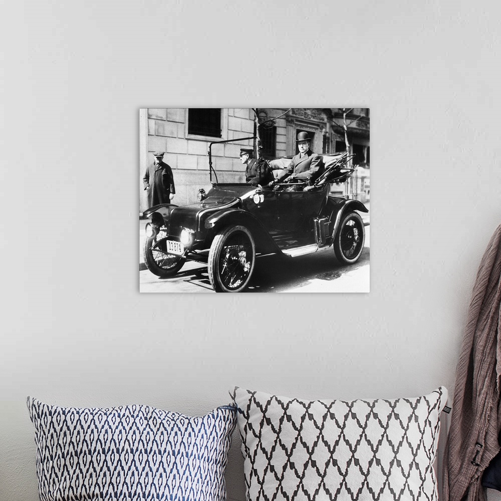 A bohemian room featuring (1839-1937). American oil magnate. Photographed in his electric car, 1920.