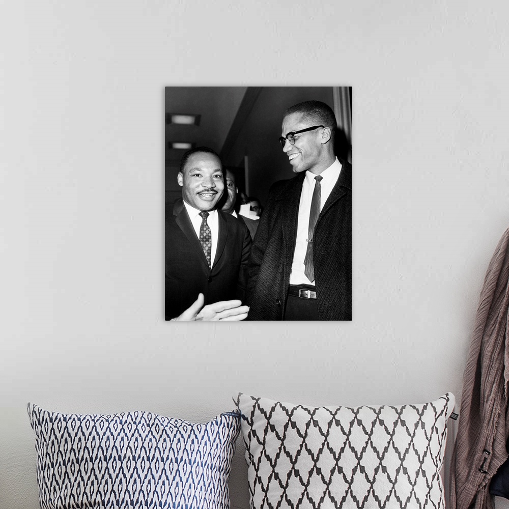 A bohemian room featuring KING AND MALCOLM X, 1964. Dr. Martin Luther King Jr. (left), American cleric and civil rights lea...