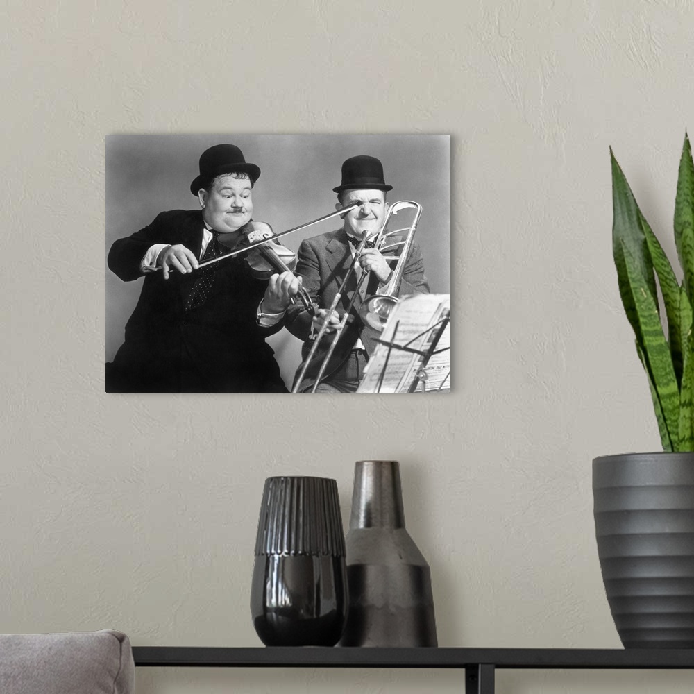 A modern room featuring 433.34.LAUREL AND HARDY.