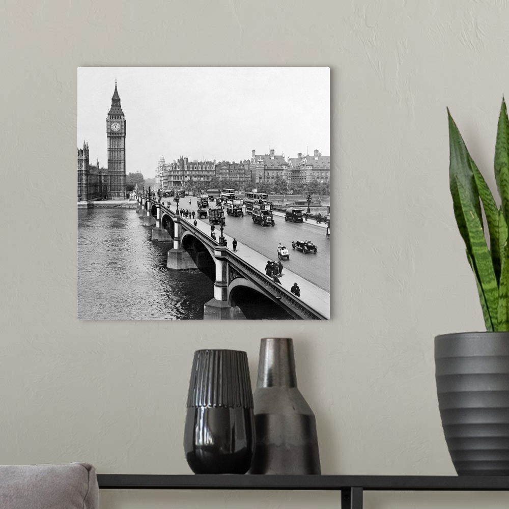 A modern room featuring Westminster Bridge with Big Ben and the Houses of Parliament in the background. Stereograph, c1926.