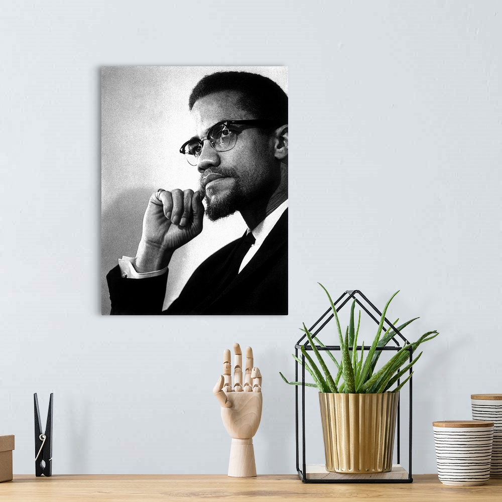 A bohemian room featuring MALCOLM X (1925-1965). Originally Malcolm Little. American religious and political leader. Photog...