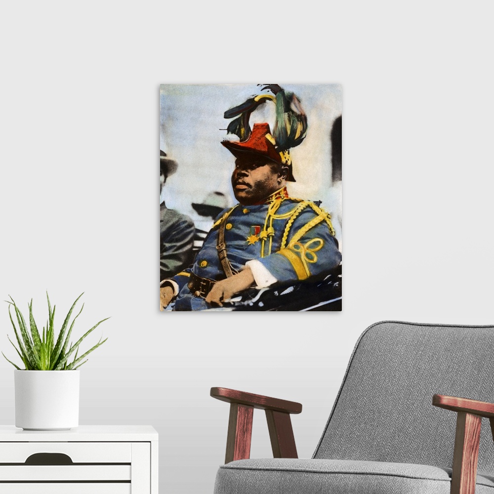 A modern room featuring MARCUS GARVEY (1887-1940). Jamaican black-nationalist leader. Oil over a photograph, c1922.