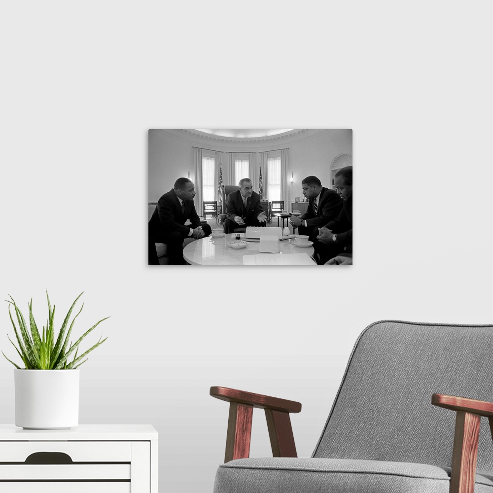 A modern room featuring MARTIN LUTHER KING, JR. (1929-1968). American clergyman and civil rights leader. In a meeting wit...