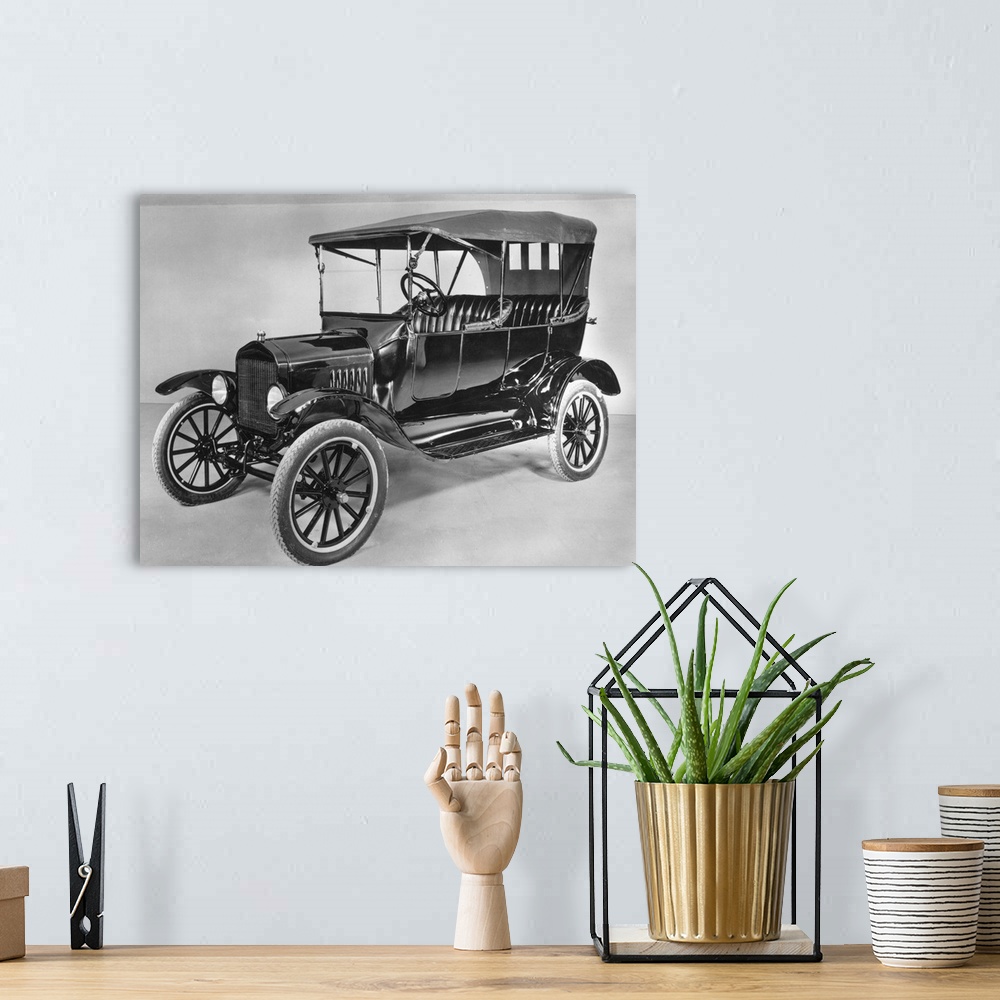 A bohemian room featuring 57.14.AUTOMOBILES: Model T Ford (1921).