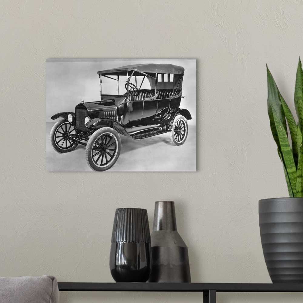 A modern room featuring 57.14.AUTOMOBILES: Model T Ford (1921).