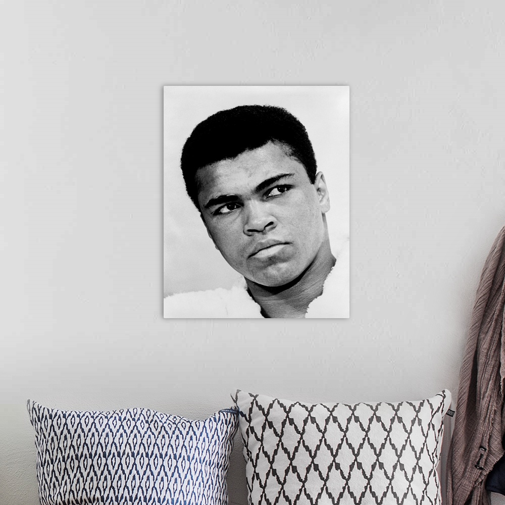 A bohemian room featuring MUHAMMAD ALI (1942-2016). Nee Cassius Clay. American heavyweight boxer. Photograph by Ira Rosenbe...