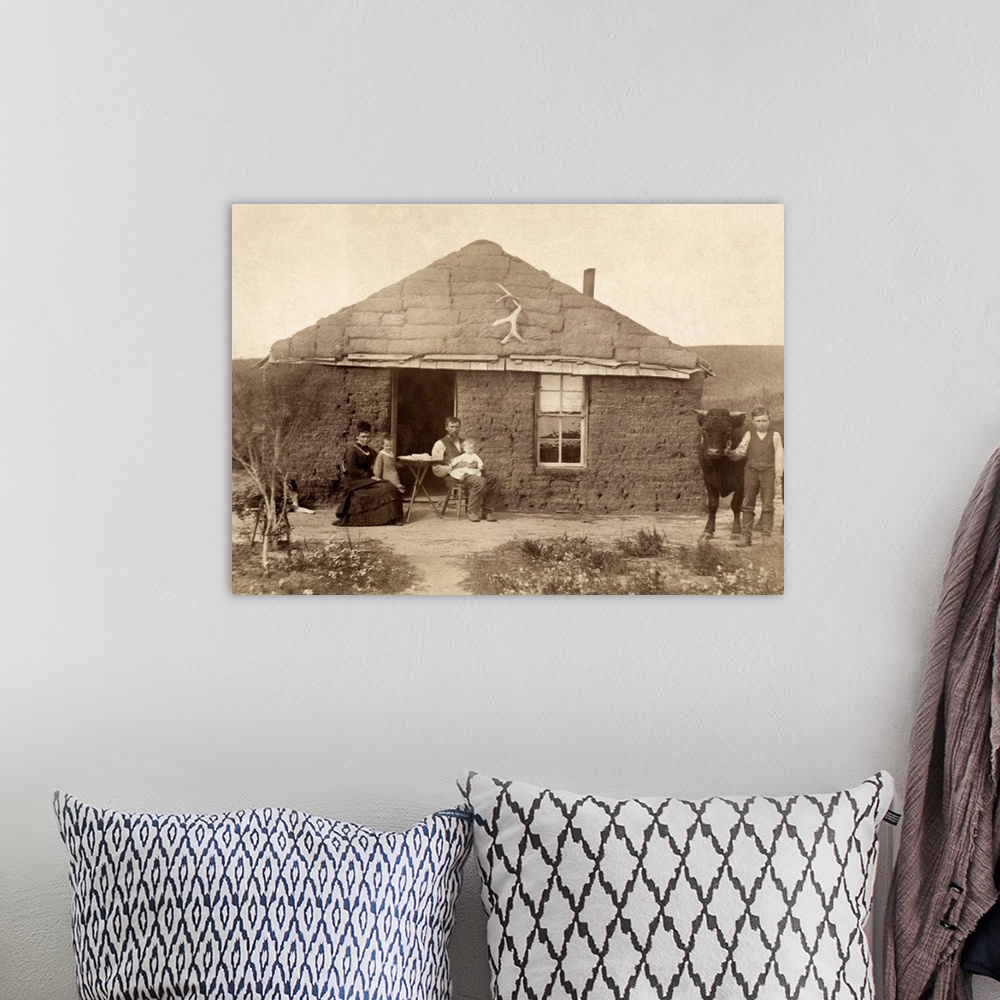A bohemian room featuring Nebraska, Settlers, C1886. Family Of Homesteaders, Photographed Outside Of their Sod House With A...