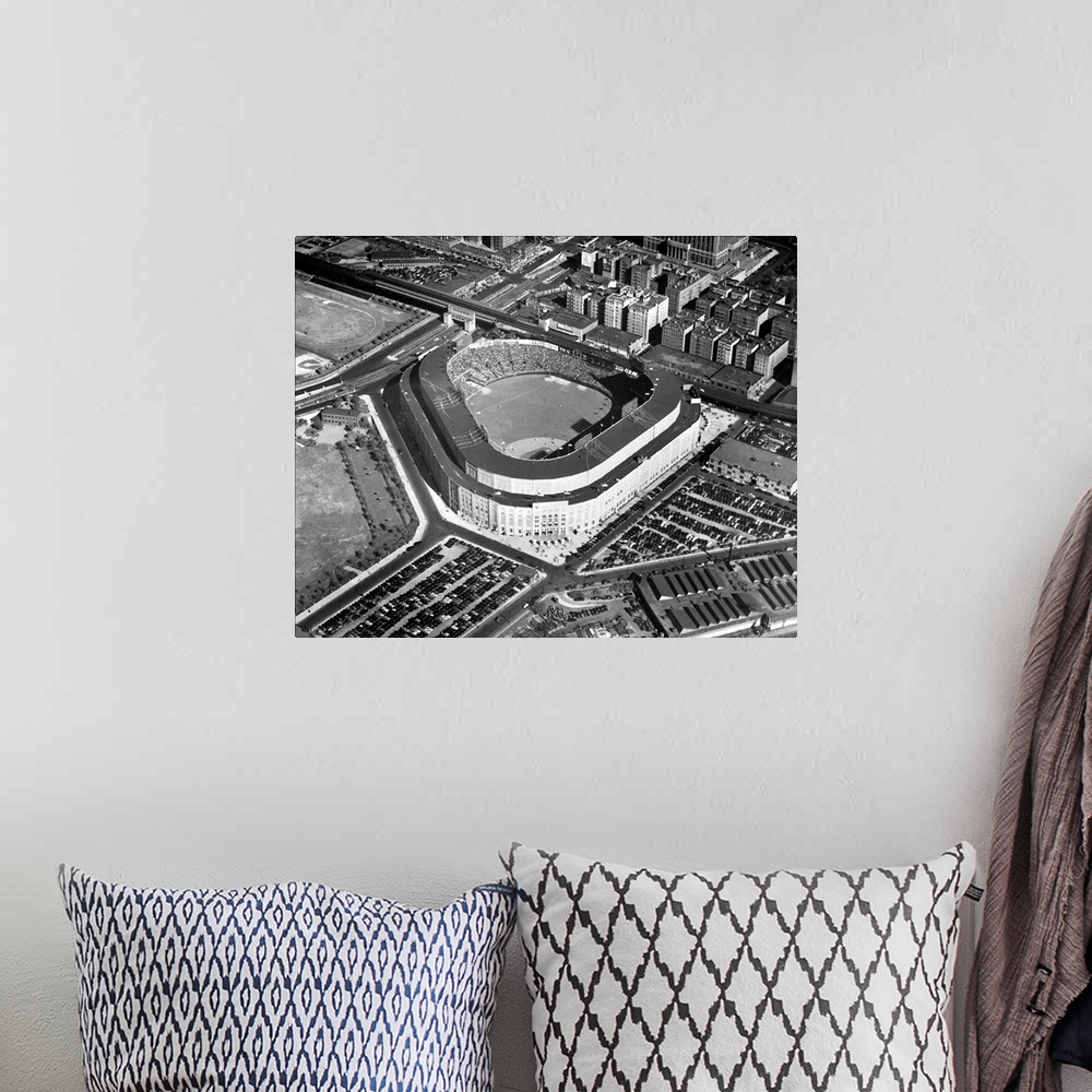 A bohemian room featuring Aerial view of Yankee Stadium in the Bronx, where an audience of 73,000 is watching the opening g...