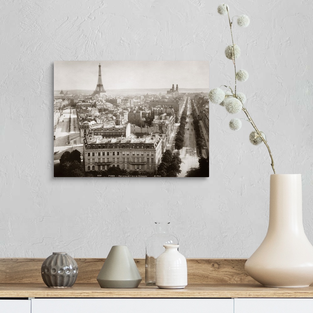 A farmhouse room featuring View of Paris form l'Arc de Triomphe, c1900. On th left Avenue Marceau runs towards the Eiffel To...