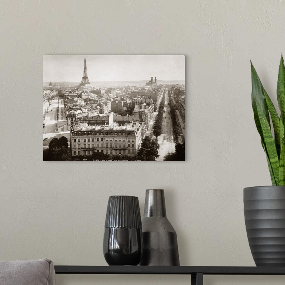 A modern room featuring View of Paris form l'Arc de Triomphe, c1900. On th left Avenue Marceau runs towards the Eiffel To...