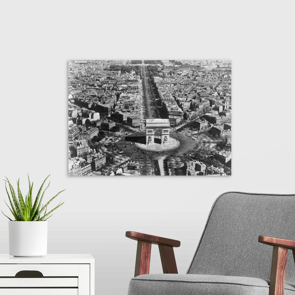 A modern room featuring Bird's eye view of Les Champs-?lys?es and l'Arc de Triomphe in Paris, c1900.