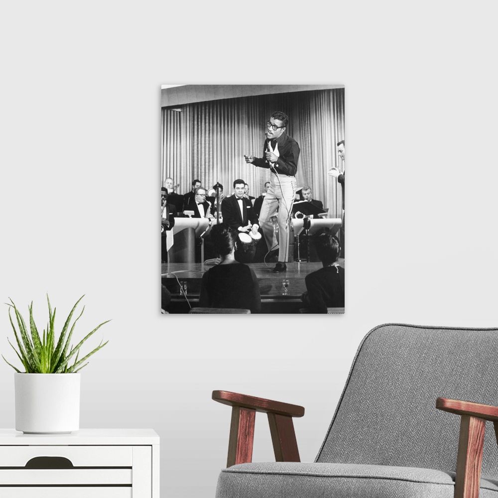 A modern room featuring (1925-1990). American actor and singer. Undated photograph.