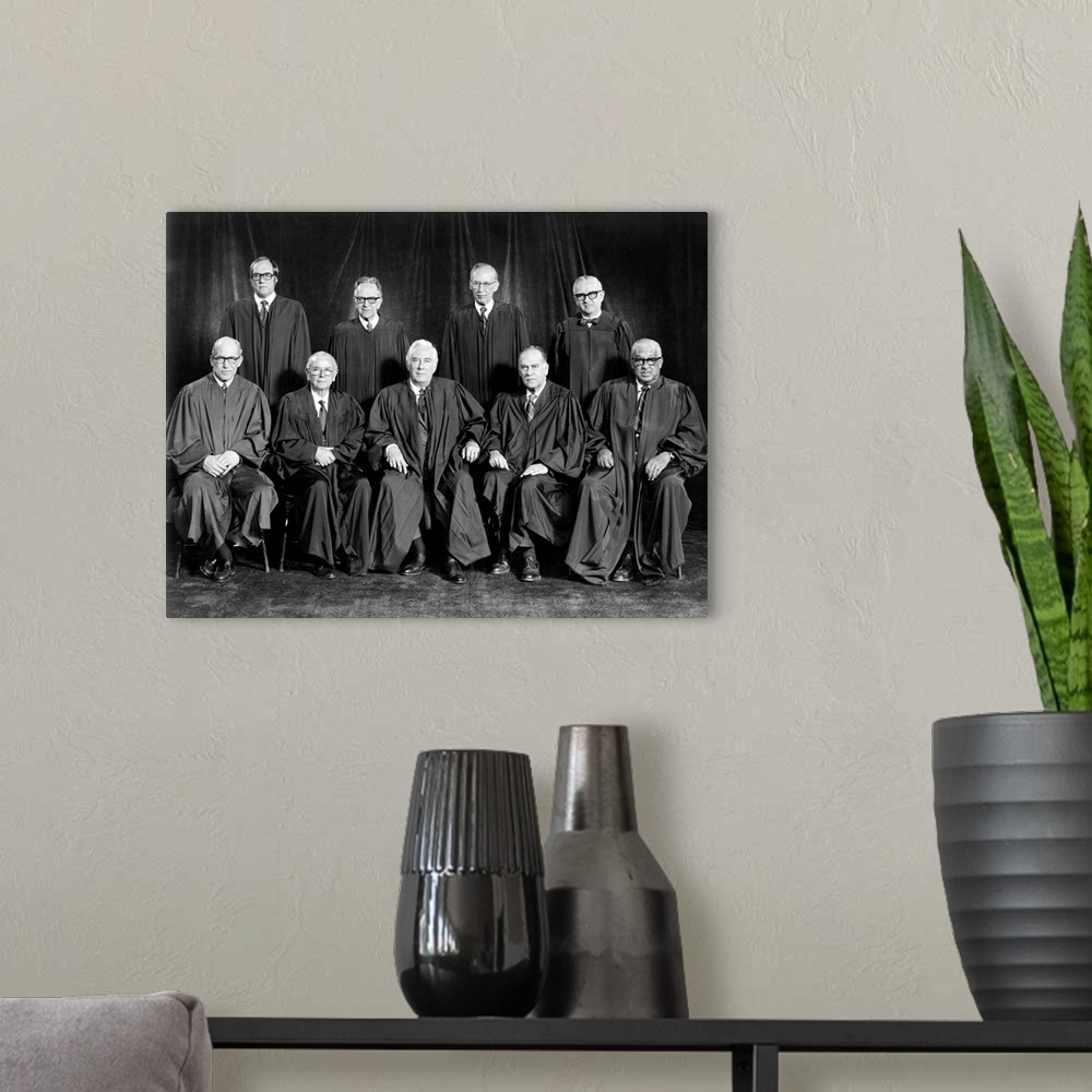 A modern room featuring SUPREME COURT, 1976. Portrait of Justices William J. Brennan, Jr., Bryon R. White, Harry A. Black...