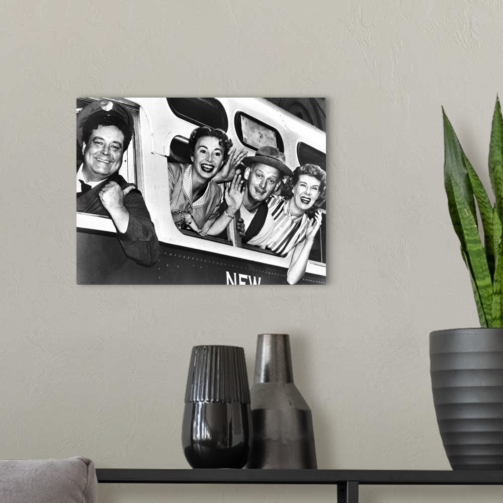 A modern room featuring Left to right: Cast members Jackie Gleason, Audrey Meadows, Art Carney, and Joyce Randolph in a p...
