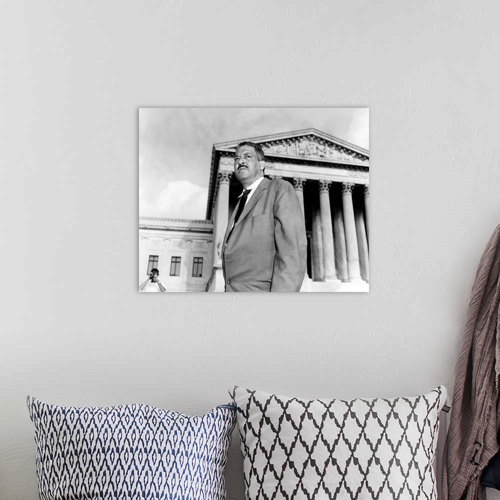 A bohemian room featuring THURGOOD MARSHALL (1908-1993). American jurist. Photographed before the Supreme Court in Washingt...