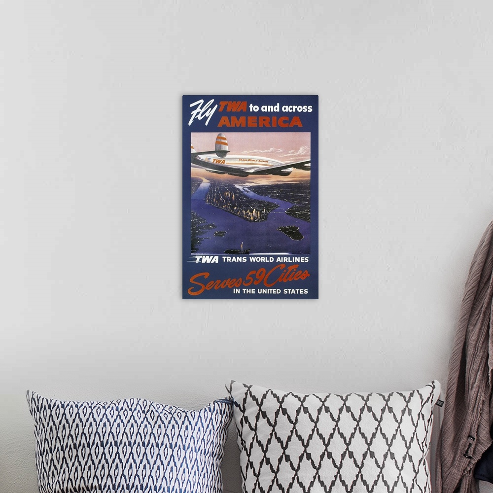 A bohemian room featuring A 1950s Trans-World Airlines poster showing a TWA Lockheed Constellation over Manhattan.