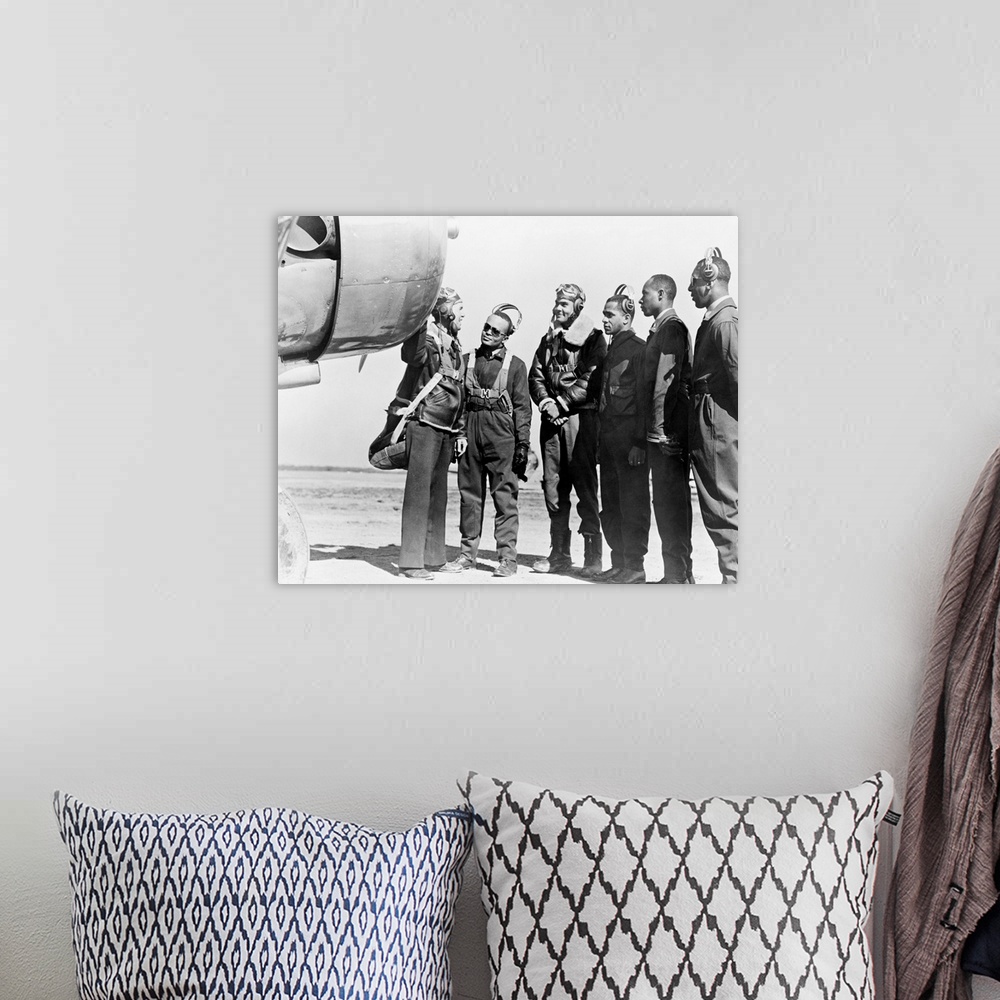 A bohemian room featuring Members of the first group of African American pilots in the history of the U.S. Army Air Corps a...