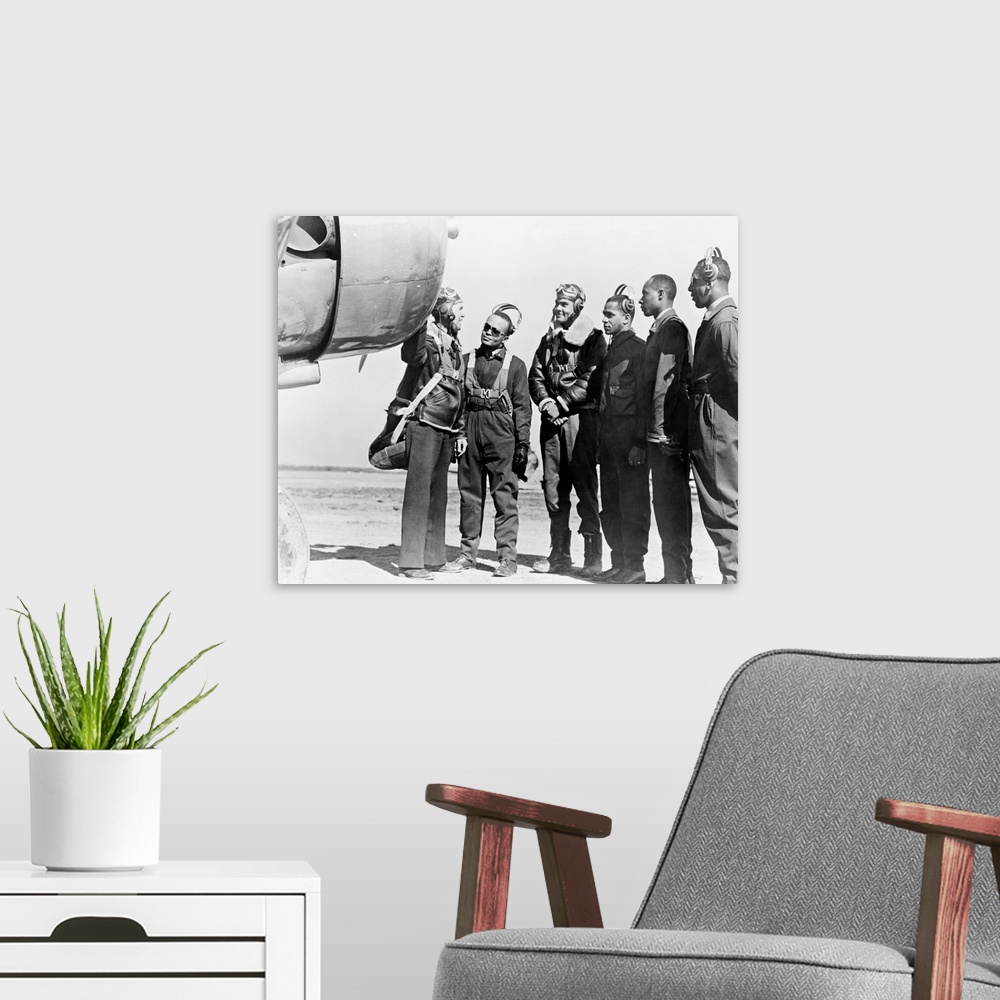 A modern room featuring Members of the first group of African American pilots in the history of the U.S. Army Air Corps a...