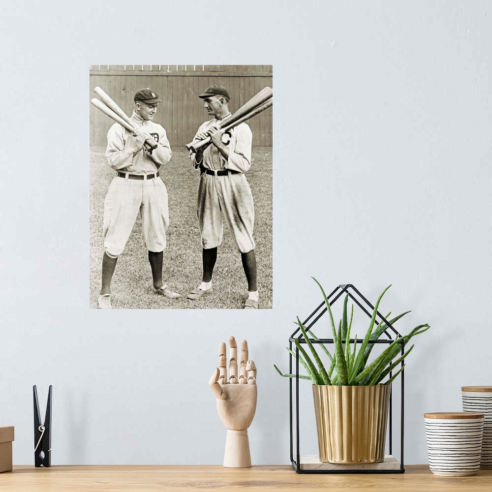 A bohemian room featuring Ty Cobb (1886-1961) and 'Shoeless' Joe Jackson (1888-1951). American baseball players. Photograph...