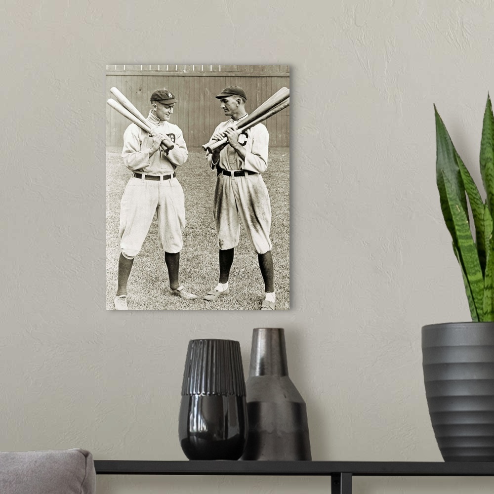 A modern room featuring Ty Cobb (1886-1961) and 'Shoeless' Joe Jackson (1888-1951). American baseball players. Photograph...