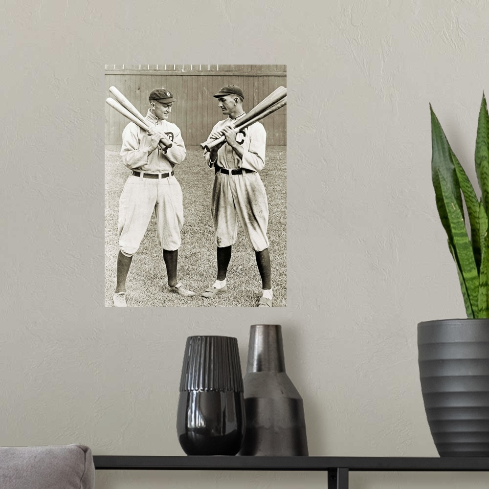 A modern room featuring Ty Cobb (1886-1961) and 'Shoeless' Joe Jackson (1888-1951). American baseball players. Photograph...