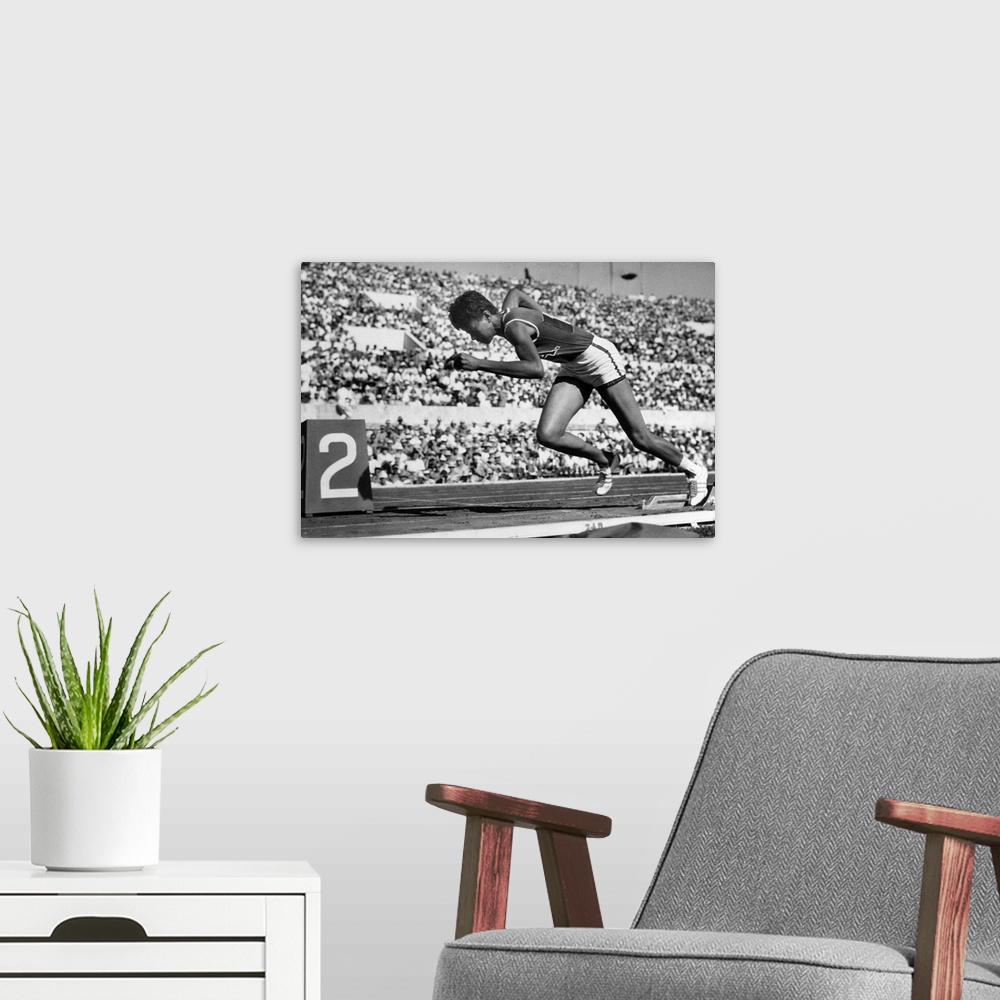 A modern room featuring American track and field athlete, photographed at the start of a race during the 1960 Summer Olym...