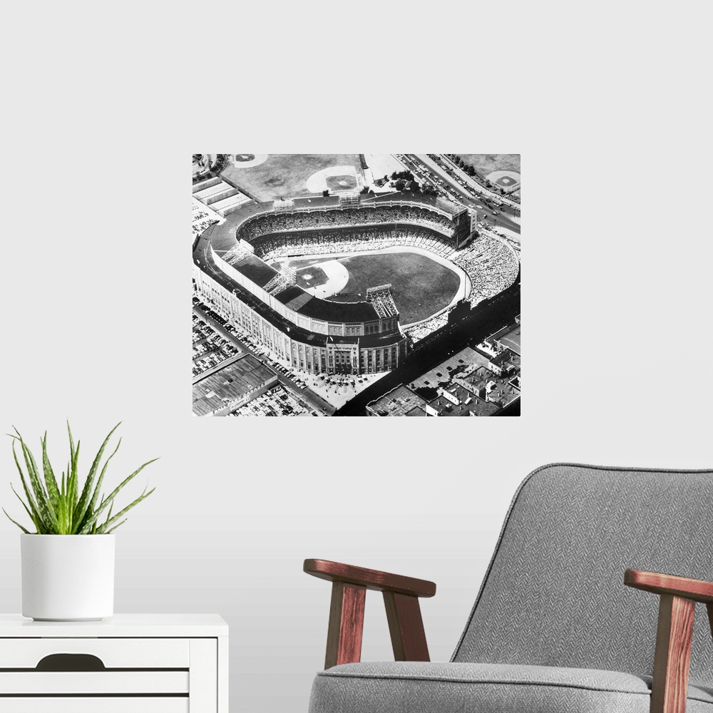 A modern room featuring Aerial view of Yankee Stadium in the Bronx, New York City. Photograph, c1955.